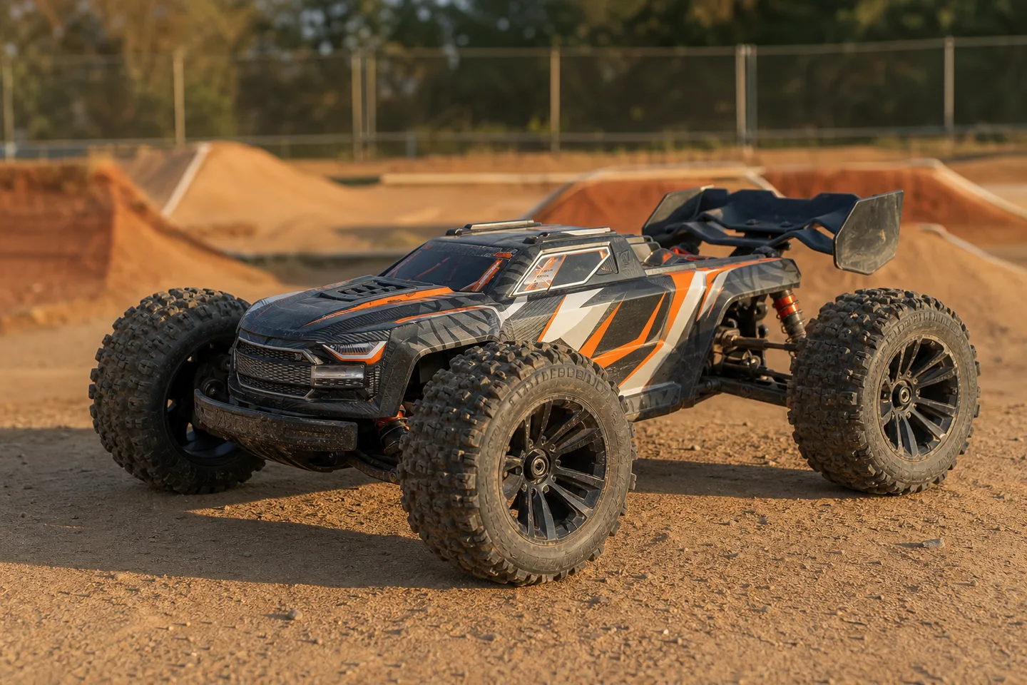 Large-scale brushless RC basher truck at a dirt track